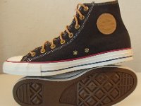 Black and Biscuit High Top Chucks  Inside patch and sole views of black and biscuit high top chucks.